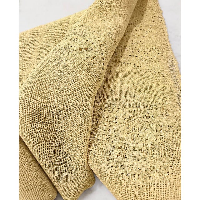 Beautifully understated, this vintage Italian linen tablecloth celebrates the quiet elegance of natural fibers and...