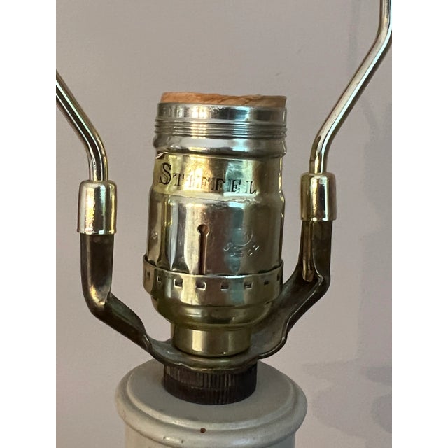 Stiffel brass table lamp mid century modern with ribbon base motif, heavy and solid