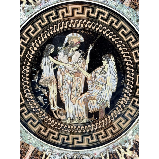This Vintage black and 24 K gold hand painted Greek Depastas ceramic decorative plate. Manufactured in Greek by Stakias P.
