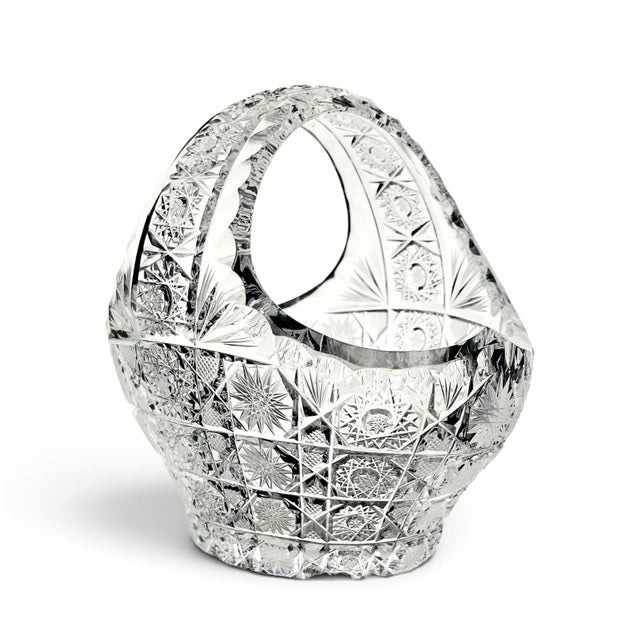 A mid-to-late twentieth-century Czech / Bohemian Queen’s Lace cut-crystal handled basket, distinguished by exceptionally...