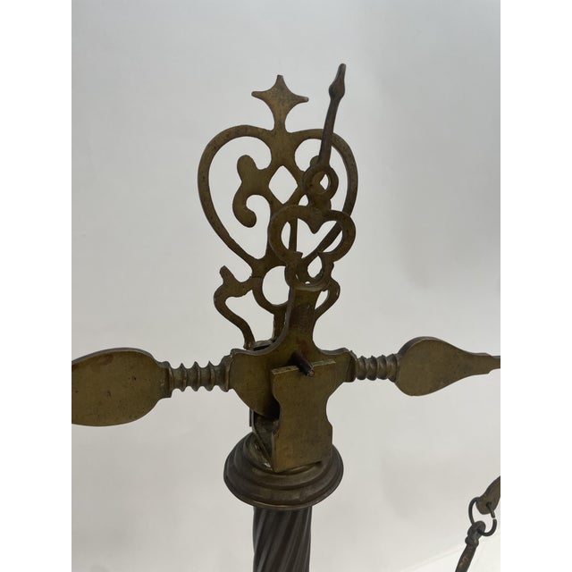 Ancient scale in worked bronze, with marble base. Excellent furnishing object