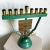 Celebrate tradition with this stunning vintage menorah lamp featuring the “12 Tribes of Israel” motif. The vibrant brass...