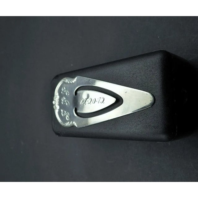 This marvelous vintage bookmark is created in gorgeous sterling silver by S. Kirk & Son. The elongated cartouche shape has...