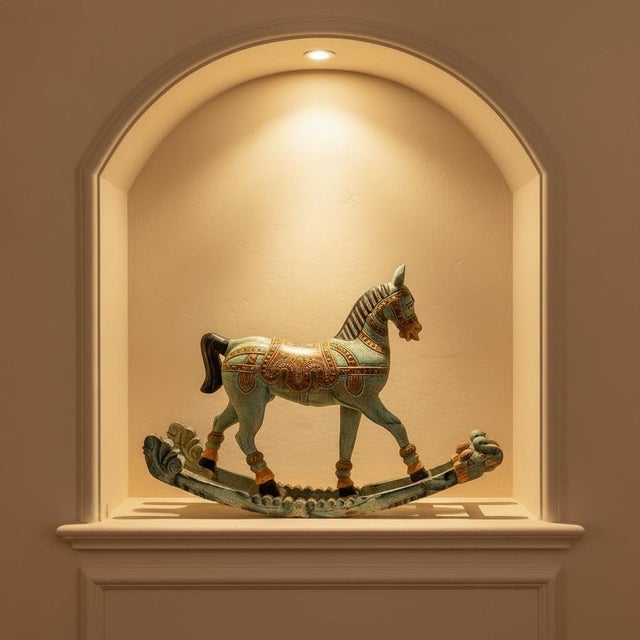 Dimensions: 42" W x13" D x 31" H This vintage rocking horse sculpture is a decoarative piece of art that can enhance a...