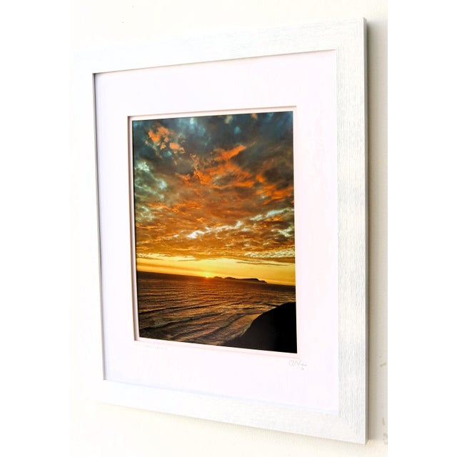 A spectacular sunset photographed across the Pacific Ocean from the coast of Lima Peru. This large scale color manipulated...