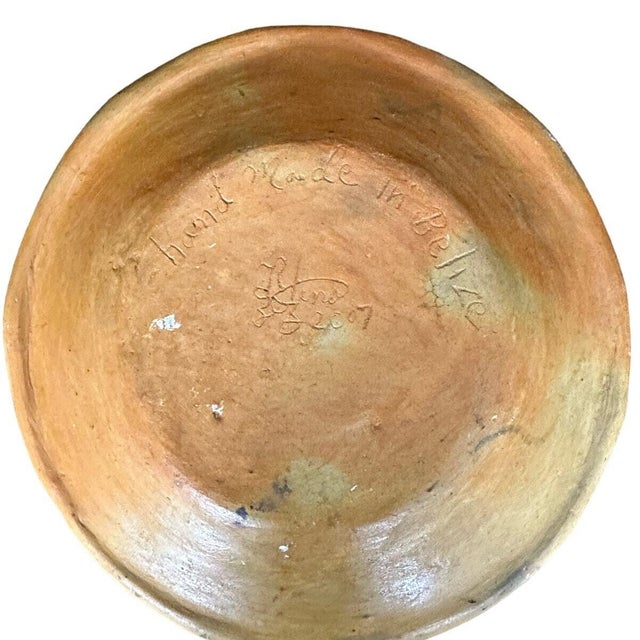 Distinctive handmade Belizean studio art pottery bowl dating to 2007. This unusual sculptural bowl features hand-modeled...