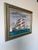 A beautifully composed 1977 maritime oil painting by R. Seaman, depicting a classic three-masted American sailing vessel...
