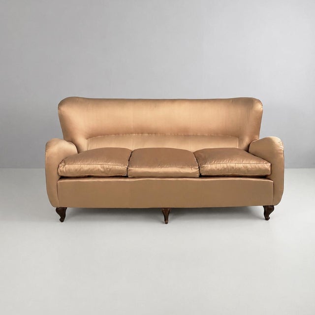 Italian mid-century modern three-seater pink beige silk sofa with original upholstery, 1940s. The backrest and armrests...