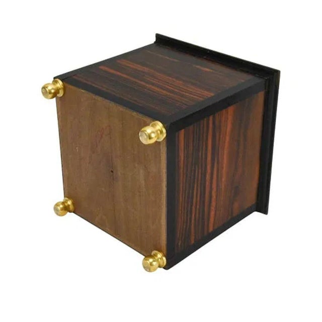 A pair of Regency style small square planters with inset wood panels with distinctive grain on all four sides, four brass...