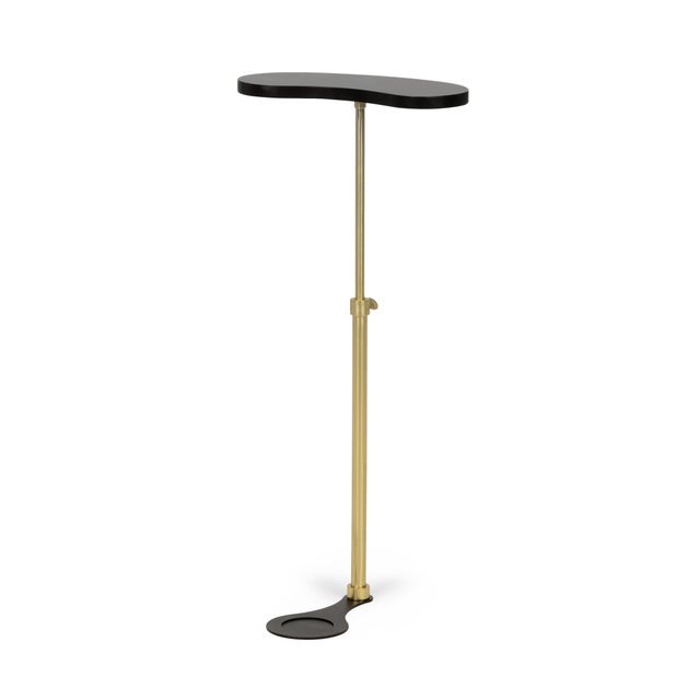 Black and antique brass finish. Iron - adjustable. Drink table