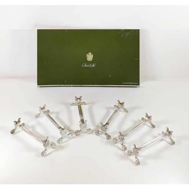 Christofle. 12 Louis XIV style knife rests, "Shells" model. 1950. France. Measurements: 1 inch high, 3.7 inches long....