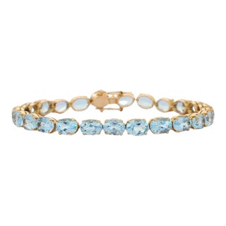 28.5 Carats Blue Topaz Gemstone Tennis Bracelet in 18k Yellow Gold For Sale
