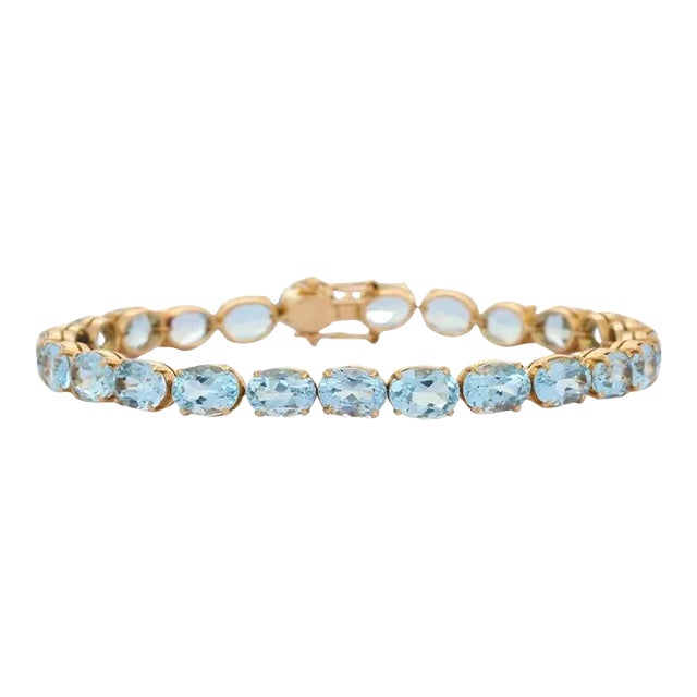 28.5 Carats Blue Topaz Gemstone Tennis Bracelet in 18k Yellow Gold For Sale
