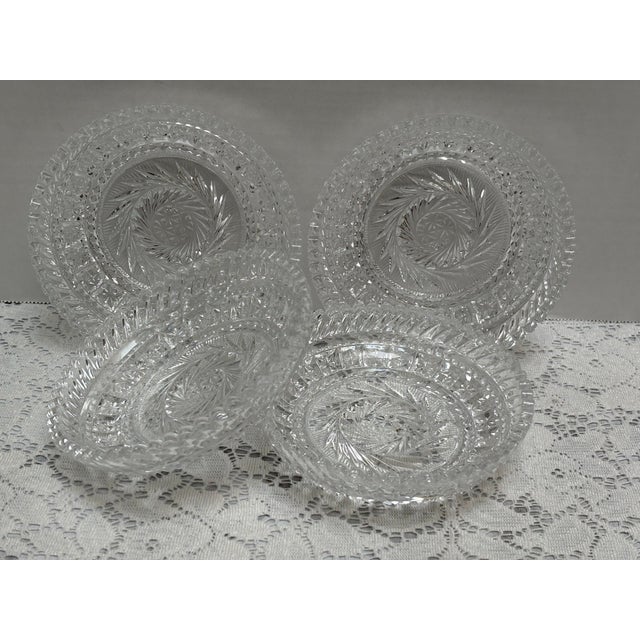 Vintage set of four etched glass berry bowls or candy dishes. Perfect as candle trays as well with the sparkling patterned...