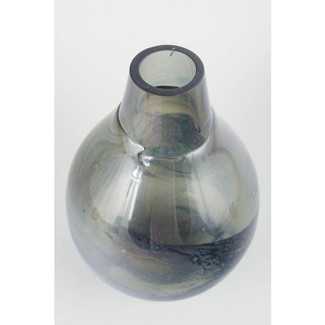 Pukeberg Glasbruk Large mouth-blown art glass vase, 1970s. Pear-shaped studio glass vase with atmospheric, landscape-like...