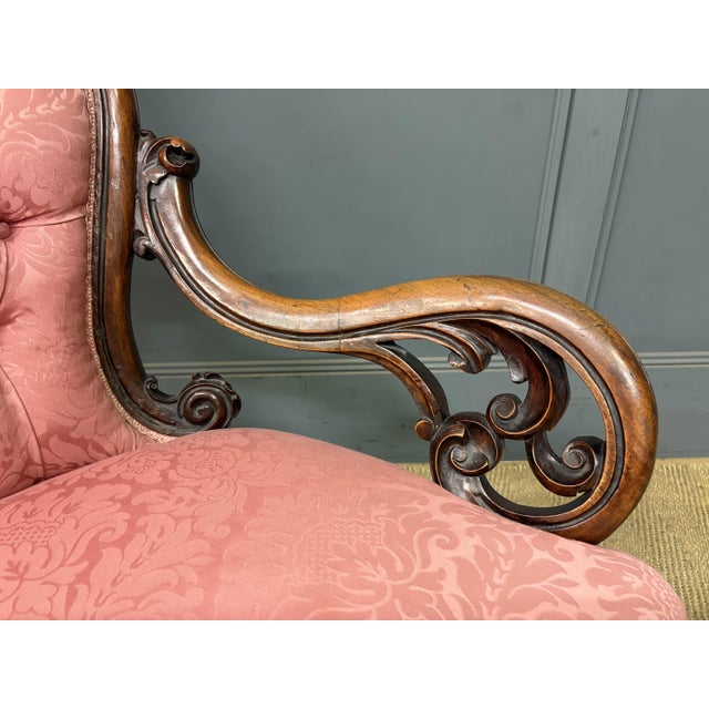 A charming pair of mid-Victorian period "his and hers" show frame nursing chairs. Of very good construction in solid...