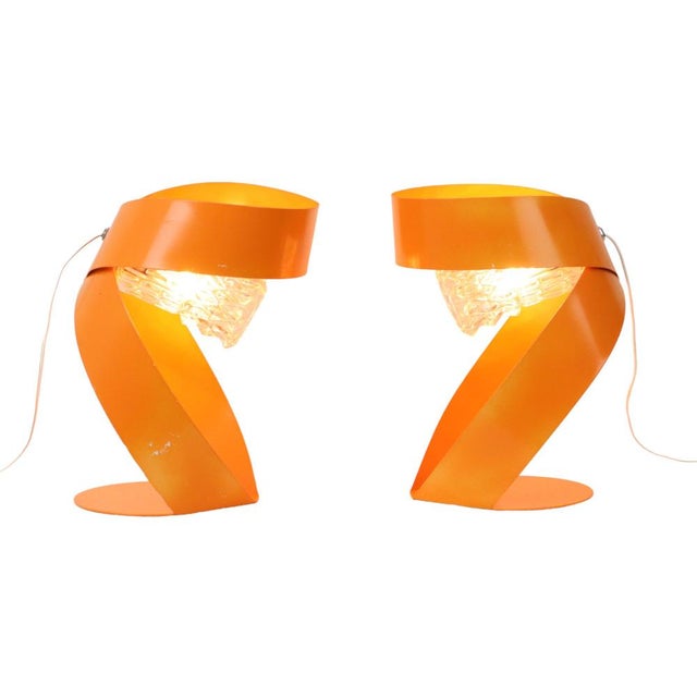 Set of two abstract orange table lamps in a distinct Space Age style—sleekly designed accent lamps made from orange-...