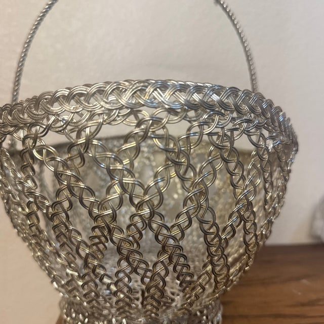 An elegant vintage silver-tone center-piece basket designed in the classic Georgian and Victorian style. This striking...