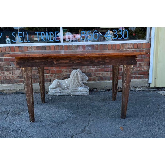 Primitive antique farmhouse table. All pine construction. Tapered legs that were probably whitewashed at one time. Three...