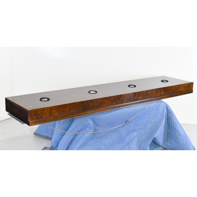 Bring sculptural sophistication and warm illumination to your space with this striking Canopy Light Bridge from Drexel...