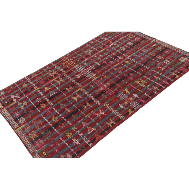 This vintage 6x9 Persian Kilim is a mid-century piece believed to be a Shahsavan tribal rug. Handwoven in wool, it...