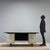1960s desk featuring a solid lacquered metal structure, typical of the industrial design of the era. The top is enhanced...