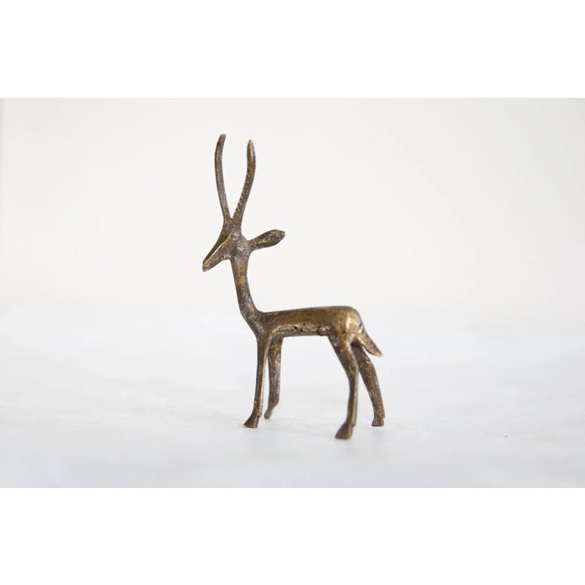 :: Vintage handmade African dark bronze gazelle. Circa mid 20th century and possibly older, this piece has such incredible...