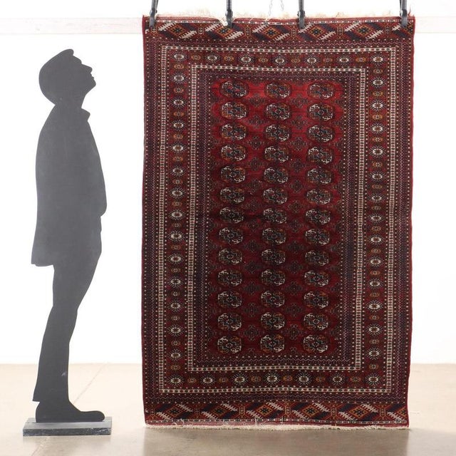 Bukhara rug in cotton and wool, fine knot, manual production. This piece is attributed to the mentioned designer/maker. It...