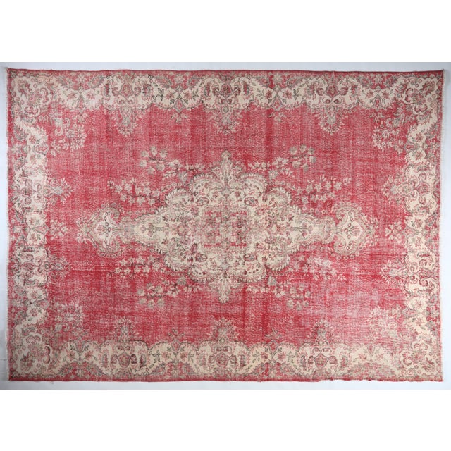 Add depth and drama to your space with this striking vintage Turkish rug, hand-knotted with masterful precision and...