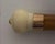 Bone handle, gold-tone collar and double eyelet, wood shaft (possibly birch), possibly bone ferrule; No maker marks...