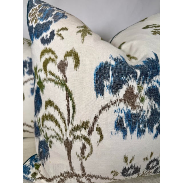 Custom pair of 22" pillows covered in Scalamandre "Kew Gardens Warp Print" in color blues on ivory. These pillows are...