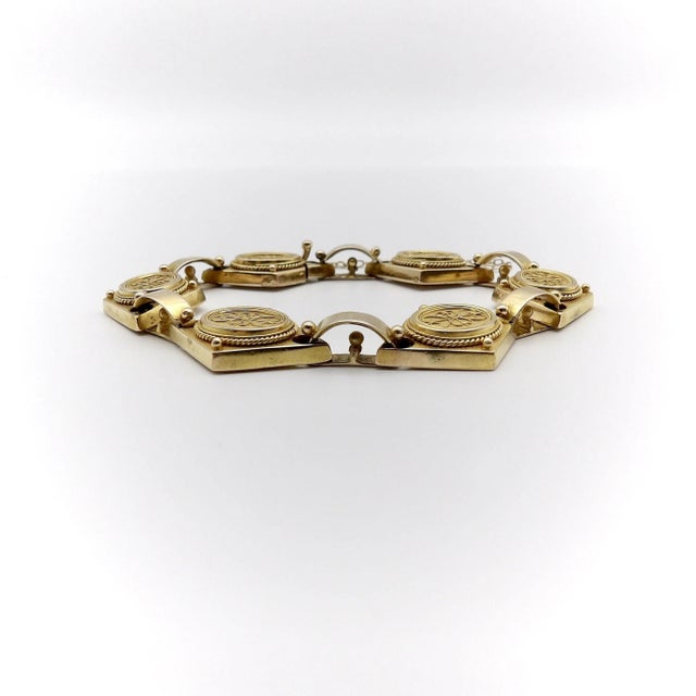 This is part of Chairish’s Fine Jewelry assortment. A beautiful 14k yellow gold bracelet from the Etruscan Revival period,...
