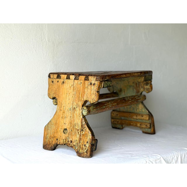 Authentic antique rustic wooden bench made from solid wood with beautiful original distressed green paint and a naturally...