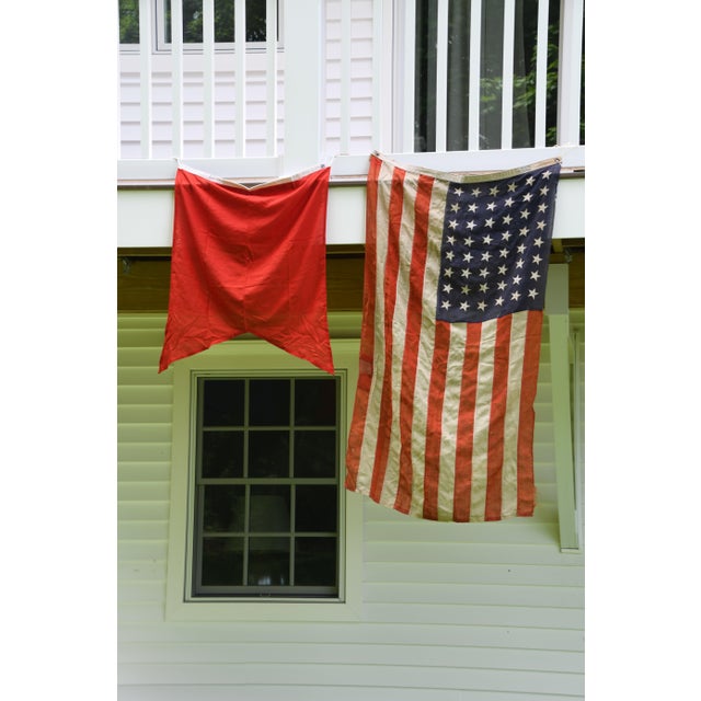 The bold red swallowtail, known as a burgee cut, belongs to the letter B in the International Code of Signals, flown by...