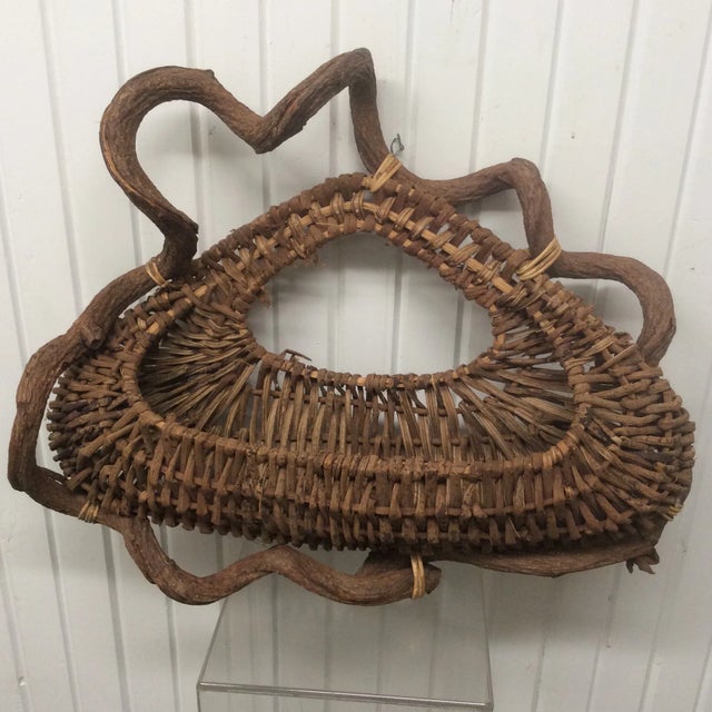 Absolutely gorgeous hand woven folk art basket with a beautiful vine handle. We ALWAYS accept reasonable offers. Before...