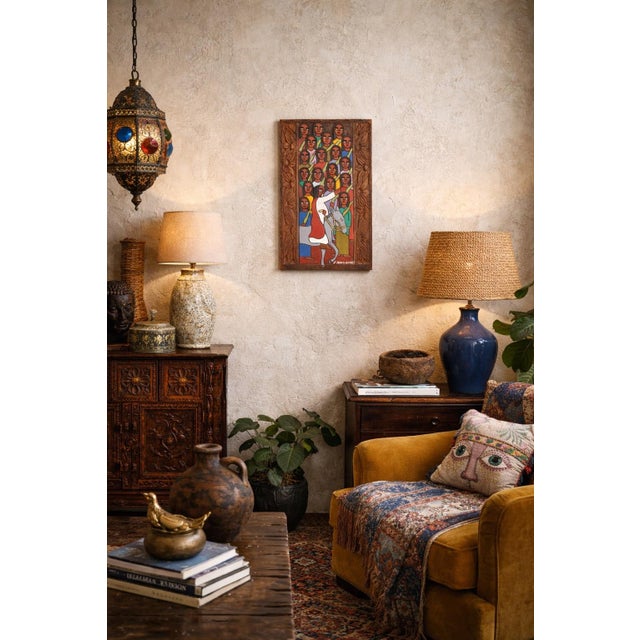 A striking 1987 Chilean hand-carved and hand-painted folk art religious wall panel, signed “F. Andrade” and dated on the...