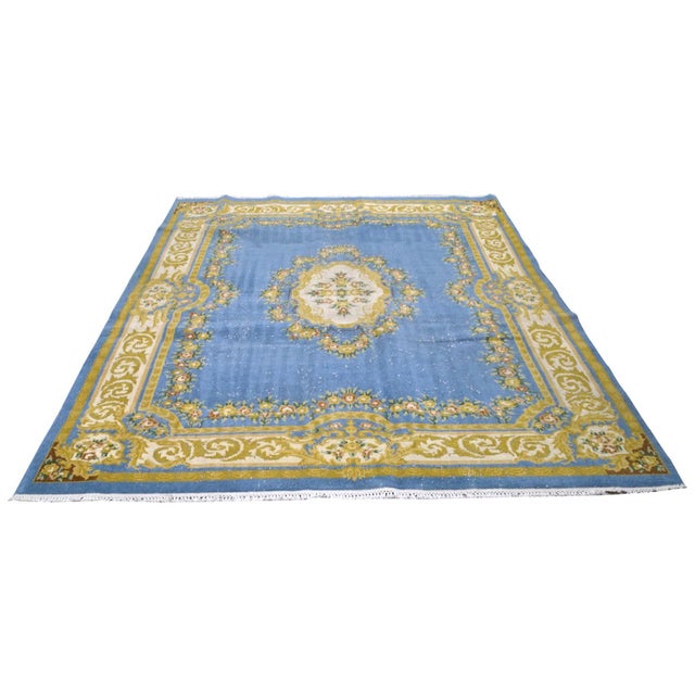 Hand-knotted with care using traditional rug-making techniques, this wool rug blends timeless craftsmanship with a modern...