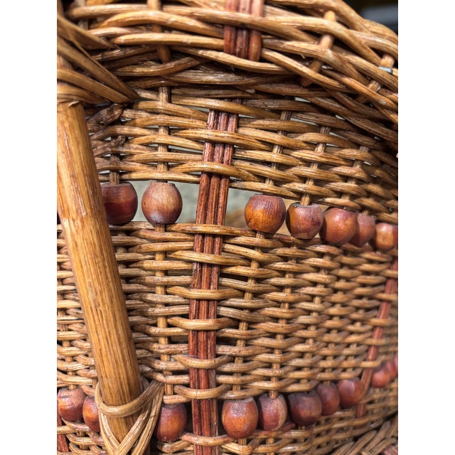 1970s Vintage 1970s Honey-Toned Wicker Basket With Wood Bead Detail & Sculptural Handles For Sale - Image 5 of 9