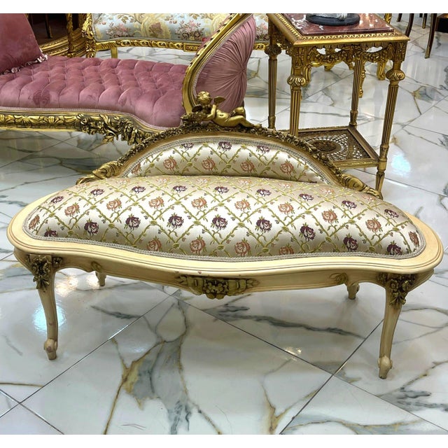 This exquisite antique French-style settee is a timeless statement piece, perfect for elegant interiors. Upholstered in...