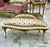 This exquisite antique French-style settee is a timeless statement piece, perfect for elegant interiors. Upholstered in...