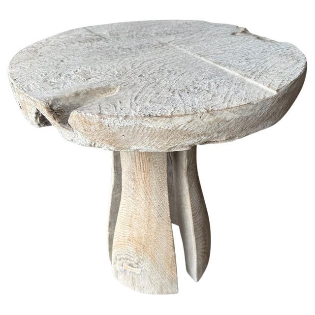 Beautiful side table featuring a thick organic ancient teak wood top and minimalist base with sleek cut outs. We added a...