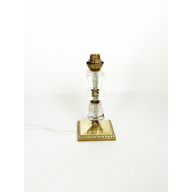 The lampshade is not included ! Elegant French table lamp dating from the 1940s, combining brass and transparent acrylic...