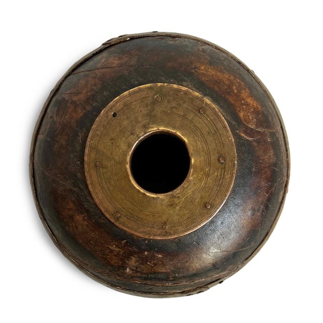 Antique old wooden tobacco container from India. Adorned with brass / metal decorative details. Each is unique and sold...