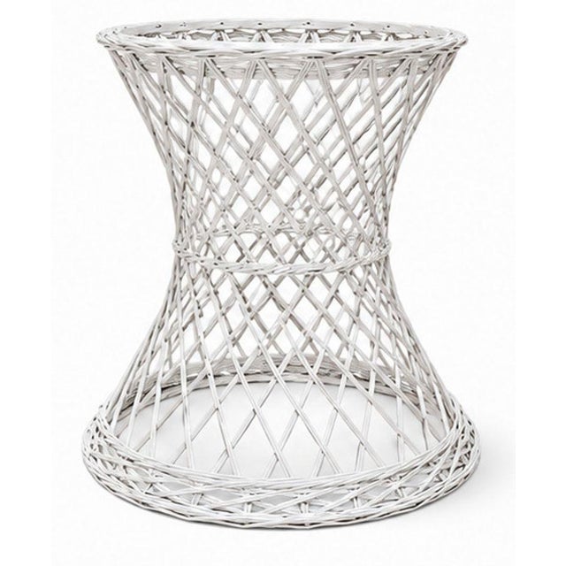 An elegant Mid-Century Modern spun fiberglass pedestal planter in the style of Russell Woodard. Featuring a graceful...