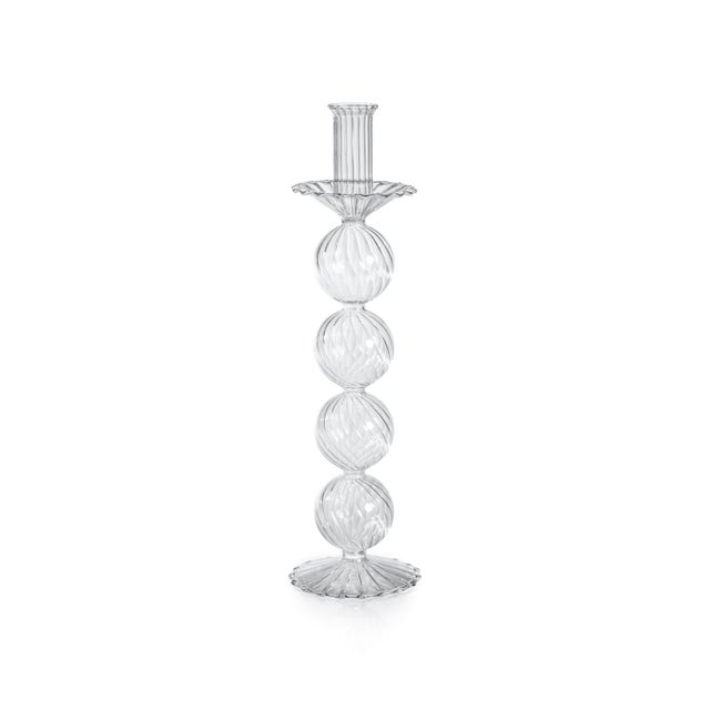 This unique and stylish candle stand set adds an elegant panache to the party decor. Features include unique modern shape...