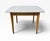 This Mid-Century Modern Heywood Wakefield Style Arts & Crafts Writing Desk is a stylish and functional piece of furniture...