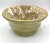 Lovely studio pottery bowl with unique thick curved exterior sides and a speckled pattern of the palest blue over a camel...