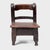 Crafted in the early 20th century, this petite Guatemalan children's chair charms with its playful asymmetry and richly...