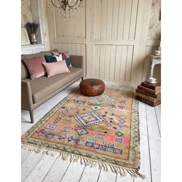 Vintage Boujad Rug | Handwoven Berber Wool Rug with Colorful Tribal Symbols This vibrant vintage Boujad rug features a...