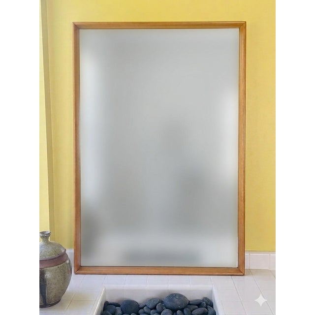 Large Heywood-Wakefield mirror from around 1960 in pristine condition. Made of finely grained light-colored "blond" solid...